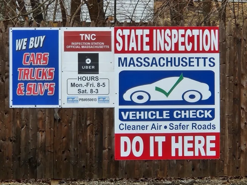 Official Massachusetts State Inspection and We Buy Cars, Trucks and SUVs signage
